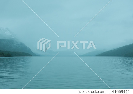 The tranquil lakes and misty landscape of Ushuaia The tranquil lakes and misty landscape of Ushuaia 141669445
