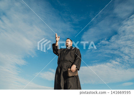Deacon Blessing With The Bible In His Hands Deacon Blessing With The Bible In His Hands 141669595