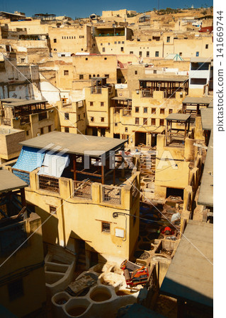 crowded historic Moroccan tanneries under the sun crowded historic Moroccan tanneries under the sun 141669744