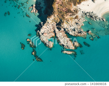Tropical Cove with Clear Water and Rocks Tropical Cove with Clear Water and Rocks 141669816