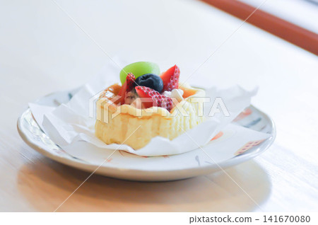 cheesecake with fruit topping or basque cheesecake with fruit topping, piece of cake cheesecake with fruit topping or basque cheesecake with fruit topping, piece of cake 141670080