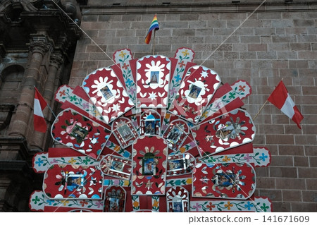 Traditional Cusco decorations and the Peruvian flag Traditional Cusco decorations and the Peruvian flag 141671609