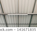 Industrial Metal Sheet Roof Structure with Steel Framework and LED Lighting Inside Factory 141671835
