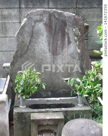 The grave of sumo wrestler Raiden, located at Hōdoji Temple in Akasaka, Minato Ward, Tokyo. The grave of sumo wrestler Raiden, located at Hōdoji Temple in Akasaka, Minato Ward, Tokyo. 141672359