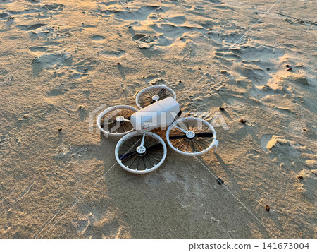 Drone on Sandy Beach Before Sunset Flight Drone on Sandy Beach Before Sunset Flight 141673004