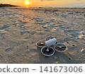 Drone on Sandy Beach Before Sunset Flight 141673006