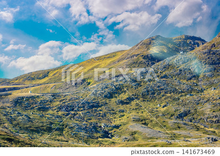 Mountain top outlined with blue sky. Beautiful nature of Norway. Mountain top outlined with blue sky. Beautiful nature of Norway. 141673469