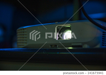 Image of a conference room projector and presentation. Image of a conference room projector and presentation. 141673941