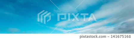 Blue sky with clouds. Cloudy sky background. Horizontal banner Blue sky with clouds. Cloudy sky background. Horizontal banner 141675168