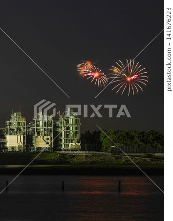 Factory night view and fireworks Factory night view and fireworks 141676223