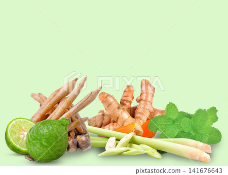A fresh assortment of Thai herbs including mint, lemongrass, fingerroot, kaffir lime, and turmeric, showcasing natural ingredients for healthy cooking and traditional herbal on white backgriound. A fresh assortment of Thai herbs including mint, lemongrass, fingerroot, kaffir lime, and turmeric, showcasing natural ingredients for healthy cooking and traditional herbal on white backgriound. 141676643
