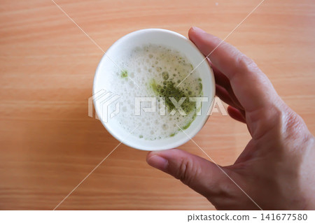 green tea or matcha green tea, milk green tea or matcha latte or matcha green tea latte in the paper glass 141677580
