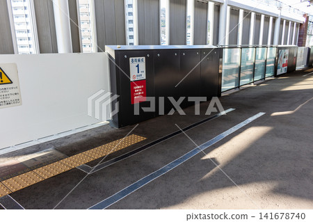 Platform screen doors and tactile paving at Shinkansen (bullet train) station platforms. Platform screen doors and tactile paving at Shinkansen (bullet train) station platforms. 141678740