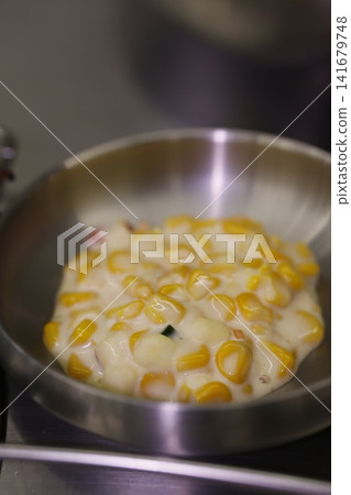 Corn and Cream in Stainless Steel Pot 141679748