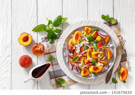 Summer fresh peach salad with red onion and cheese Summer fresh peach salad with red onion and cheese 141679830
