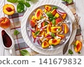Italian peach salad with cheese, basil leaves 141679832