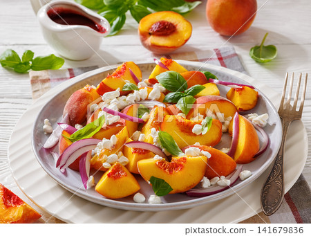 Summer fresh peach salad with red onion and cheese Summer fresh peach salad with red onion and cheese 141679836