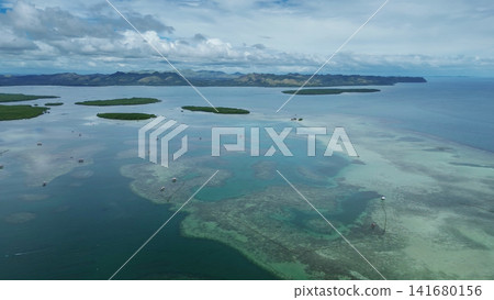 Fish farm with cages for fish and shrimp Fish farm with cages for fish and shrimp 141680156