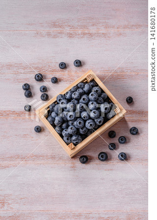 Fresh, ripe, and juicy wild blueberries as an ingredient for vegetarian dishes Fresh, ripe, and juicy wild blueberries as an ingredient for vegetarian dishes 141680178