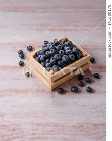 Fresh, ripe, and juicy wild blueberries as an ingredient for vegetarian dishes Fresh, ripe, and juicy wild blueberries as an ingredient for vegetarian dishes 141680179
