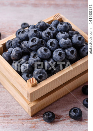 Fresh, ripe, and juicy wild blueberries as an ingredient for vegetarian dishes Fresh, ripe, and juicy wild blueberries as an ingredient for vegetarian dishes 141680181