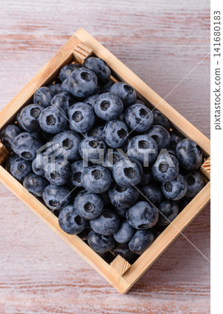 Fresh, ripe, and juicy wild blueberries as an ingredient for vegetarian dishes Fresh, ripe, and juicy wild blueberries as an ingredient for vegetarian dishes 141680183