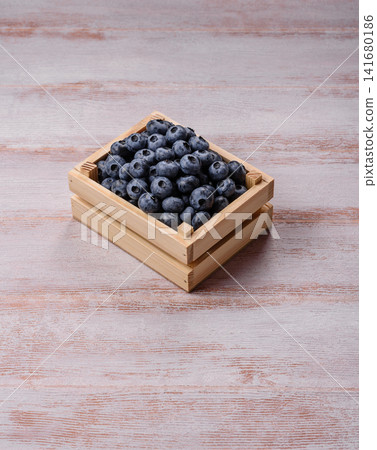 Fresh, ripe, and juicy wild blueberries as an ingredient for vegetarian dishes Fresh, ripe, and juicy wild blueberries as an ingredient for vegetarian dishes 141680186