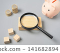 Financial materials that evoke images of asset management and investment analysis. 141682894