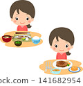 A woman sits at a table with both Japanese and Western dishes. 141682954