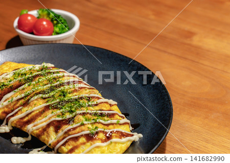Japanese-style omelet with cherry tomatoes and broccoli Japanese-style omelet with cherry tomatoes and broccoli 141682990