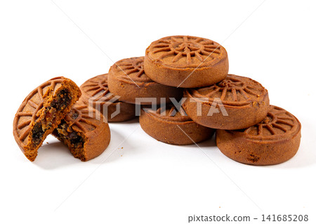 traditional Chinese jujube paste pastry mooncake with red date filling, Mid-Autumn festival dessert isolated on white background,The text in the middle of the dessert reads: "Date". traditional Chinese jujube paste pastry mooncake with red date filling, Mid-Autumn festival dessert isolated on white background,The text in the middle of the dessert reads: "Date". 141685208