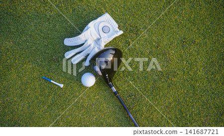 Close up of golf equipment on green grass. Close up of golf equipment on green grass. 141687721