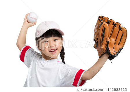 Cheerful little girl celebrating with hands up holding a baseball and a glove on white background. Cheerful little girl celebrating with hands up holding a baseball and a glove on white background. 141688313
