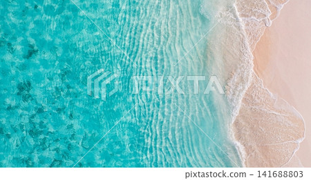 Serene aerial view of gentle waves meeting pale sand along turquoise tropical shoreline soft water gradient. Perfect summer travel seascape minimal design. Peaceful outdoors wellness copy space scenic Serene aerial view of gentle waves meeting pale sand along turquoise tropical shoreline soft water gradient. Perfect summer travel seascape minimal design. Peaceful outdoors wellness copy space scenic 141688803