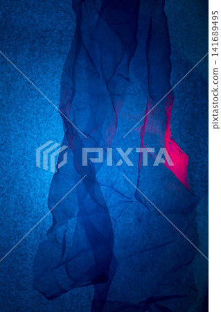Transparent thin handkerchief on a blue background Transparent thin handkerchief on a blue background 141689495