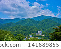 View to the west from Nanasawa Hill in Nanasawa Forest Park, Atsugi City, Kanagawa Prefecture (Oyama Mountain, city, etc.) 141689855