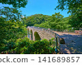 Viewing the bridge over the forest in Nanasawa, Atsugi City, Kanagawa Prefecture in early summer. 141689857