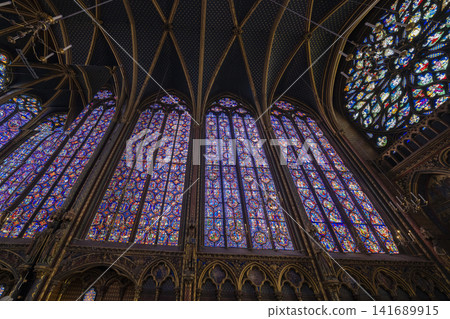 The magnificent stained glass and rose window of Sainte-Chapelle Church The magnificent stained glass and rose window of Sainte-Chapelle Church 141689915