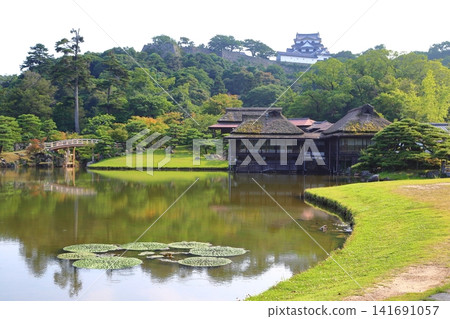View of Hikone Castle keep from Genkyu-en Garden View of Hikone Castle keep from Genkyu-en Garden 141691057