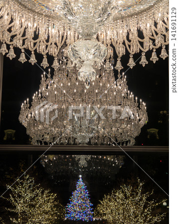 A magnificent chandelier that shines on a winter night A magnificent chandelier that shines on a winter night 141691129