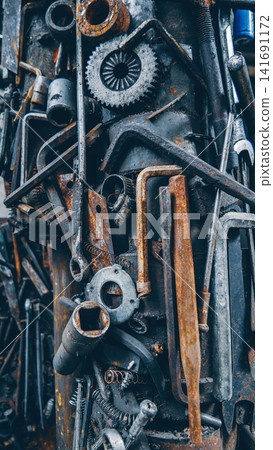 rusty automotive and motorcycle parts piled in industrial scrapyard metal recycling zone, damaged mechanical components and corroded vehicle machinery in salvage dump background rusty automotive and motorcycle parts piled in industrial scrapyard metal recycling zone, damaged mechanical components and corroded vehicle machinery in salvage dump background 141691172