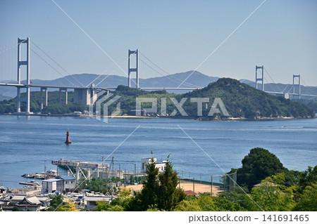 A clear day over the Seto Inland Sea! The Kurushima Kaikyo Bridge on the Shimanami Kaido. A clear day over the Seto Inland Sea! The Kurushima Kaikyo Bridge on the Shimanami Kaido. 141691465