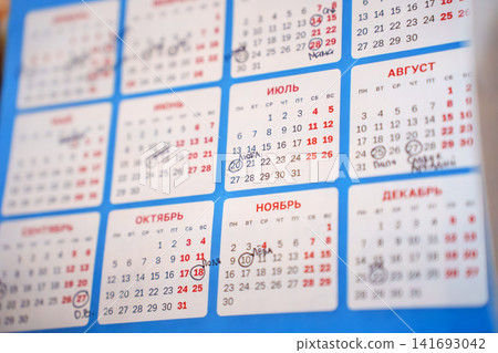 Calendar showing months of the year with marked dates and events Calendar showing months of the year with marked dates and events 141693042