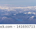 Aerial view of snow-covered mountains 141693713