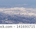 Aerial view of snow-covered mountains 141693715