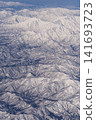 Aerial view of snow-covered mountains 141693723