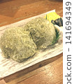 Rice ball wrapped in shredded kelp - a Japanese dish 141694349