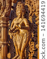 Close-up of ornate wood-carved deity statue at Sanctuary of Truth, Pattaya 141694419