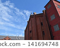 Blue sky and red brick warehouse 141694748