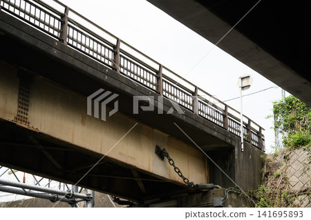 A concrete bridge viewed from below. A concrete bridge viewed from below. 141695893